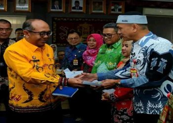 Pj. Bupati Lampung Utara Pimpin Rapat Penyerahan Rekomendasi LHP Kinerja BPK Dan LHP Inspektorat Provinsi Lampung T/A 2024