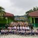 SRIGERNAS, Kapten Inf Harpian Sari Selaku Pembina Upacara Bendera Di SMPN 07 Kotabumi.