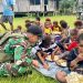 Ciptakan Kebersamaan Satgas Yonif 131/BRS Makan Siang Bersama Warga Kampung Skofro Papua.