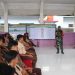 Komandan SSK Satgas TMMD ke 123 Kodim 0412/LU Lettu Inf Sugiono Sosialisasikan Masuk TNI Dihadapan Murid SMA N01 Abung Tengah.