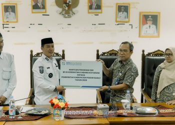 Bupati Dedi Irawan Hadiri Penyerahan Program OSR BPJS Kesehatan Cabang Kotabumi 