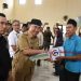 Bupati Tanggamus Serahkan 300 Bantuan Perumahan di Kecamatan Wonosobo